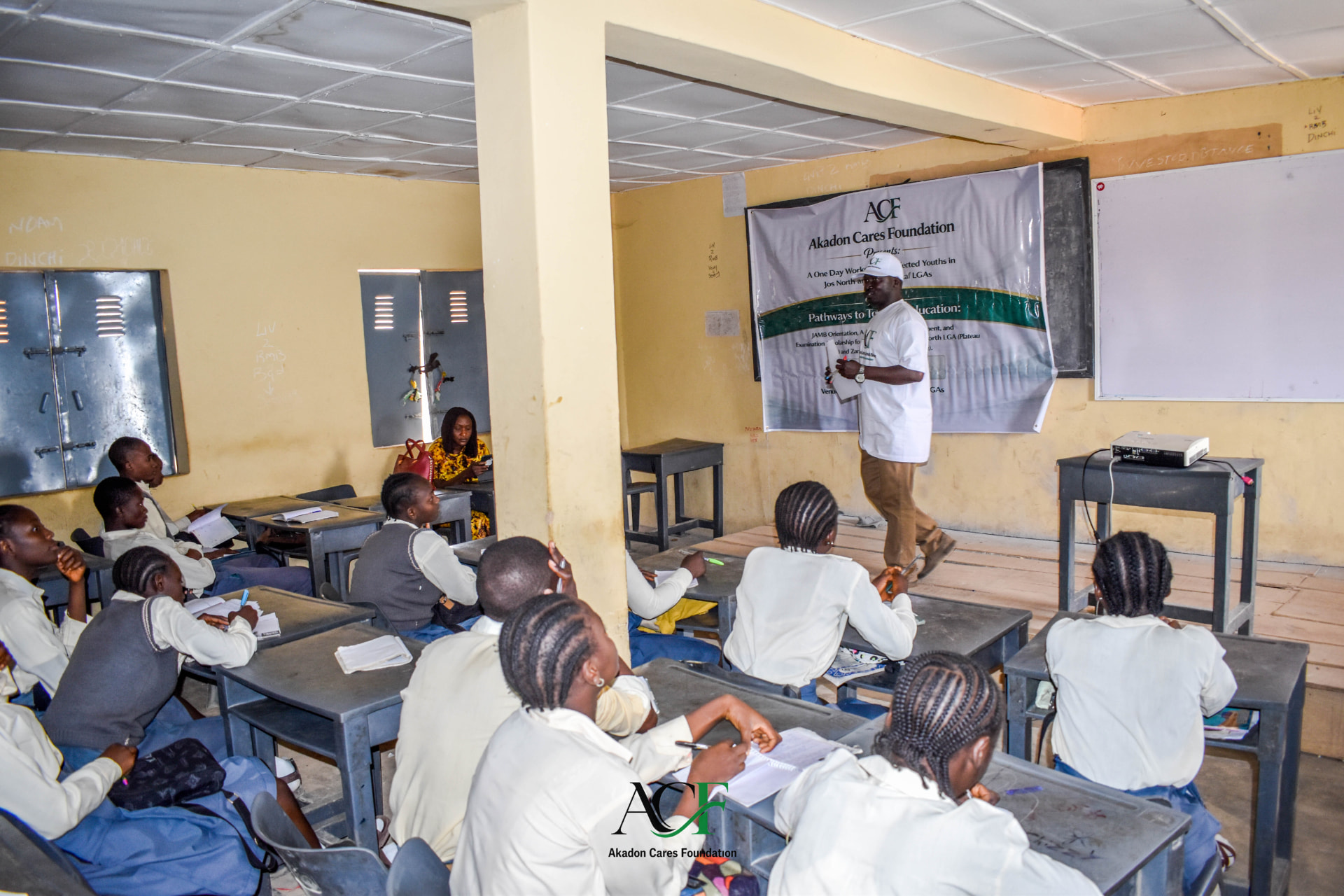 Facilitator leading a JAMB orientation session in a classroom